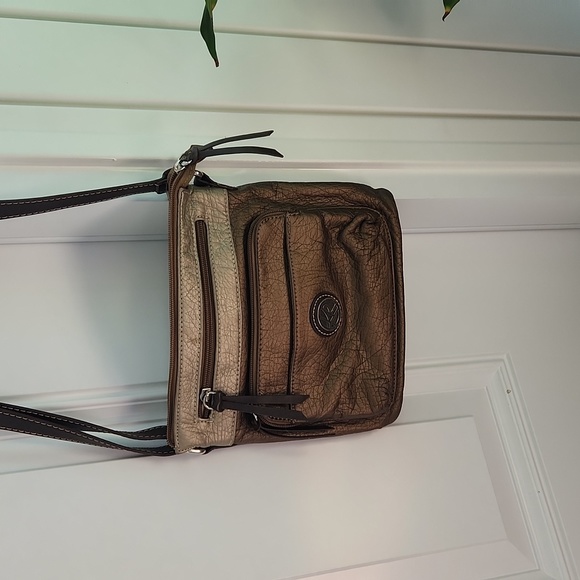 Crossbody brown and light tan color very soft in EUC. - Picture 1 of 6